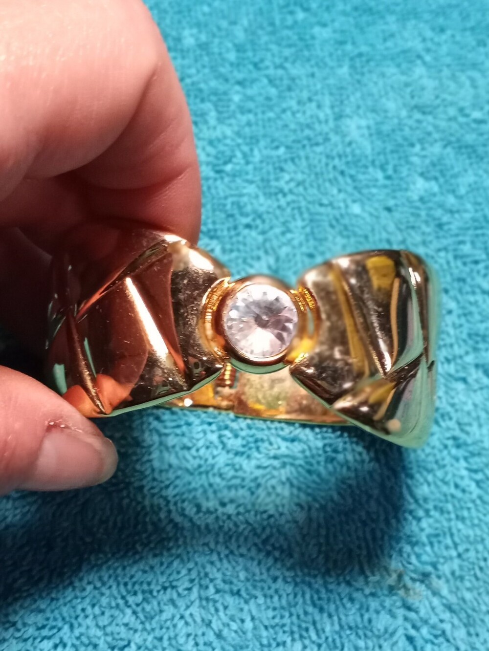 Gold-Tone Bow Cuff Hinged Bracelet with Clear Crystal Center